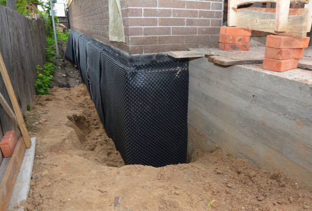 Happy homeowners after waterproofing job in New Windsor